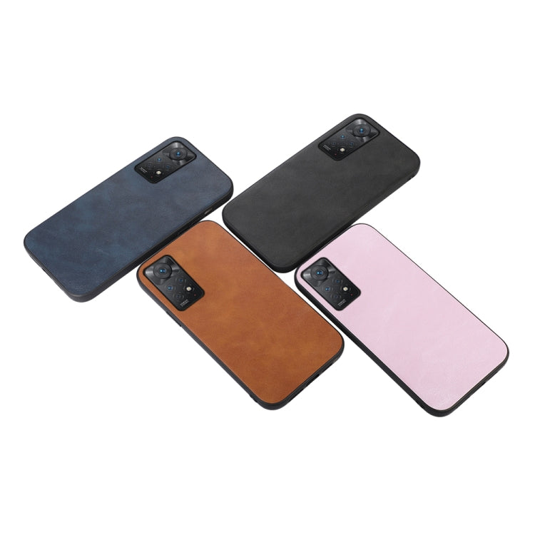 Cowhide-texture PU phone cases in blue, brown, black, and pink, angled front view.