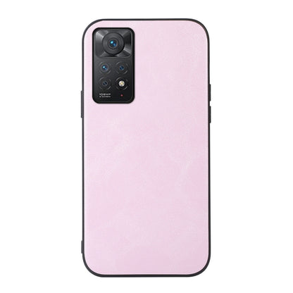 Cowhide-texture PU phone case, pink, with camera cutout and raised edge.