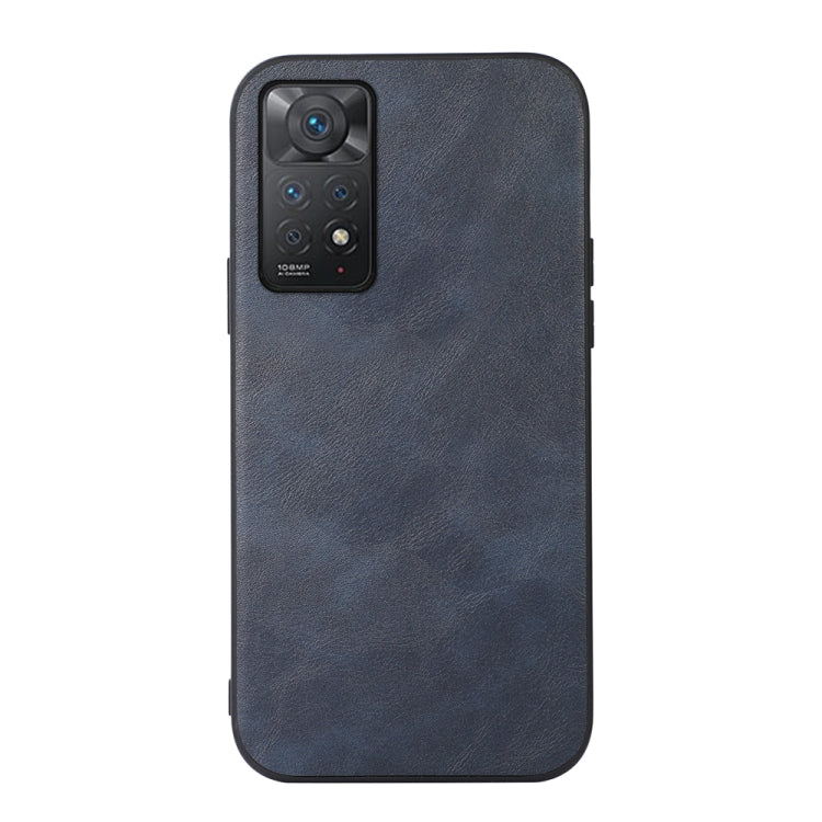 Cowhide-texture PU phone case, dark blue, front view with camera cutout and buttons.