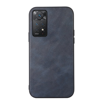 Cowhide-texture PU phone case, dark blue, front view with camera cutout and buttons.