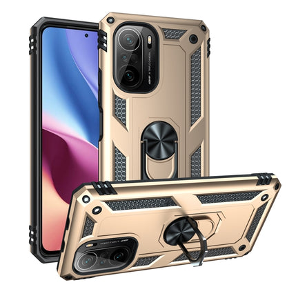 Gold shockproof phone case with textured grip and 360° rotating ring stand