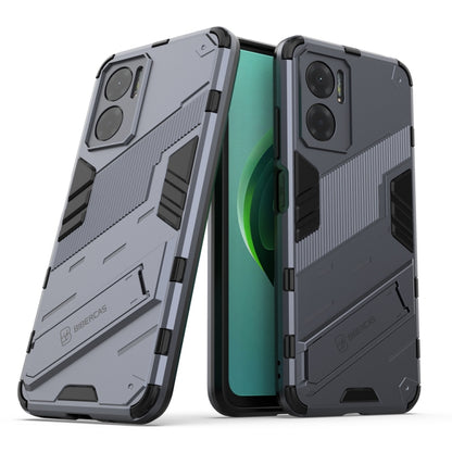 Gray rugged shockproof phone case with textured armor panels and side buttons
