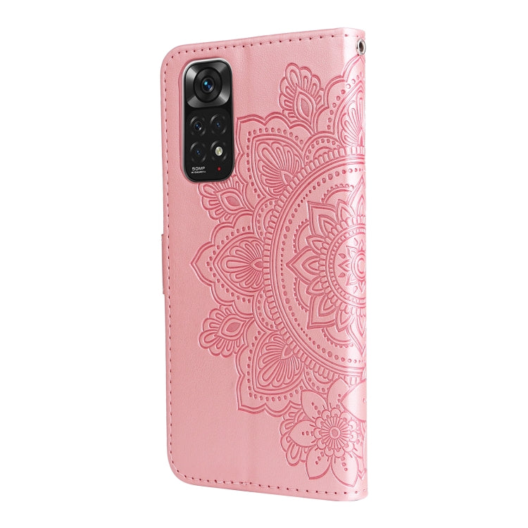 Rose gold leather wallet phone case with 7-petal embossed floral pattern and camera cutout