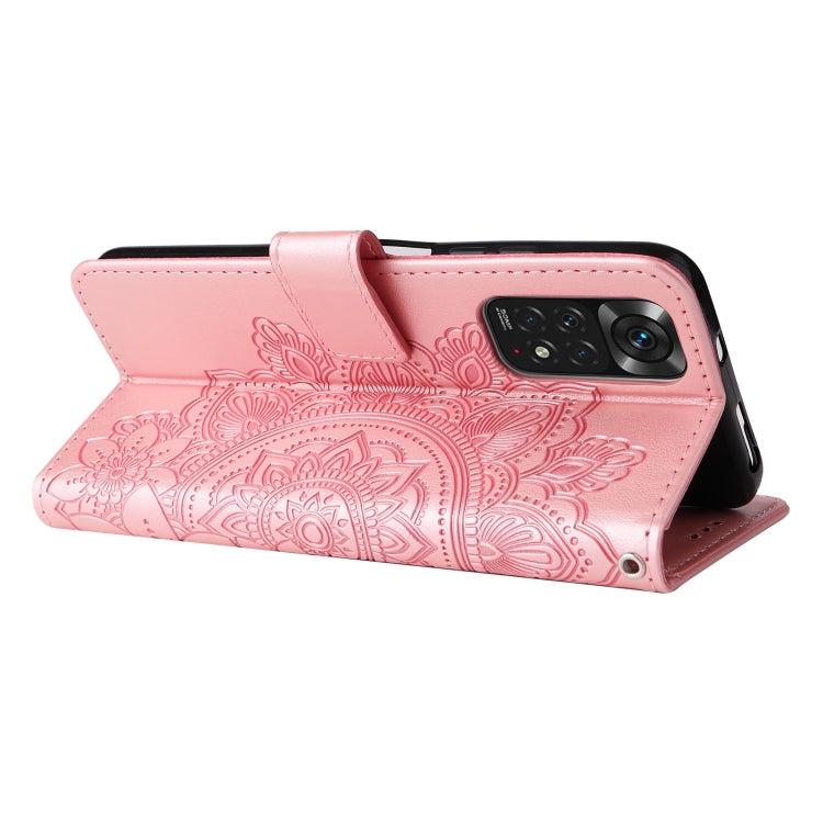 Rose gold leather horizontal flip phone case with embossed 7-petal floral pattern and stand