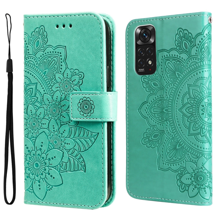 Light green leather flip phone case with embossed 7-petal floral pattern and wrist strap