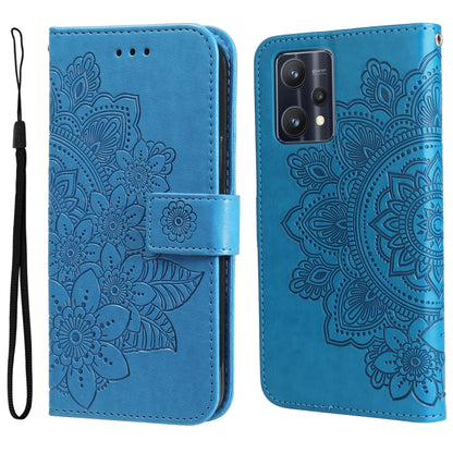 Blue embossed floral flip leather phone case with wrist strap and card-slot cutouts