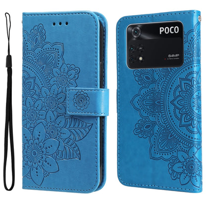 Blue embossed floral flip phone case with wrist strap and magnetic buckle