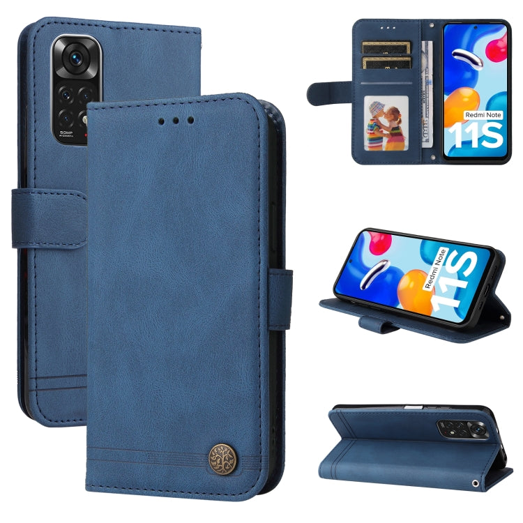 Blue leather flip phone case with metal button, card slots, and camera cutout.