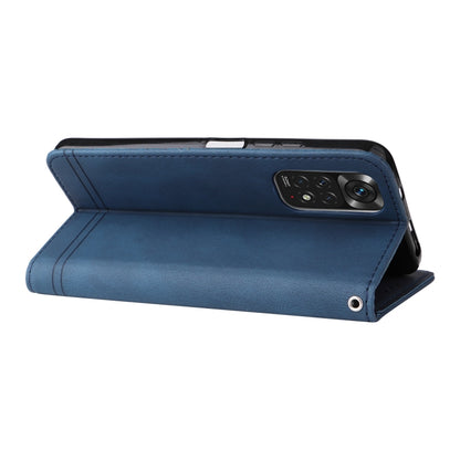 Blue leather flip phone case with rear camera opening and side kickstand.