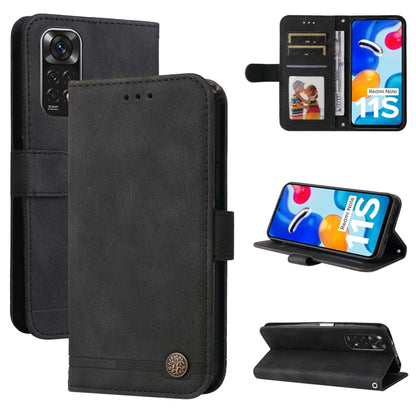 Black leather flip phone case with metal button, card slots, and camera cutout.