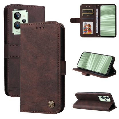 Brown leather flip phone case with metal button, card slots, and kickstand
