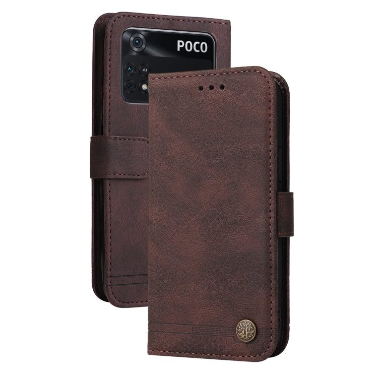 Brown leather flip phone case with side strap and metal button