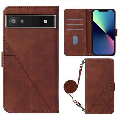 Brown embossed flip phone case with camera cutout, phone compartment and crossbody strap