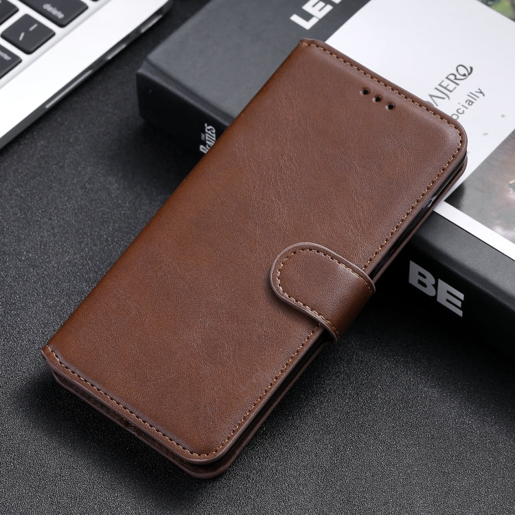 Brown horizontal flip leather phone case with stitched strap and top perforations