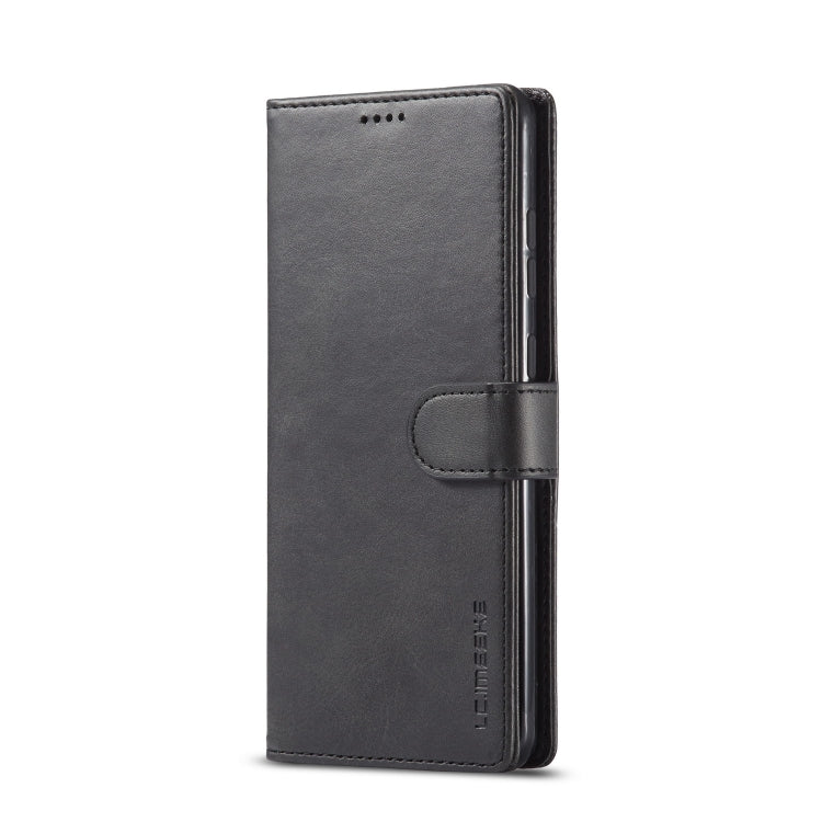 Dark gray leather phone flip case, side view with folio strap closure