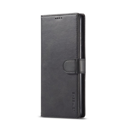 Dark gray leather phone flip case, side view with folio strap closure
