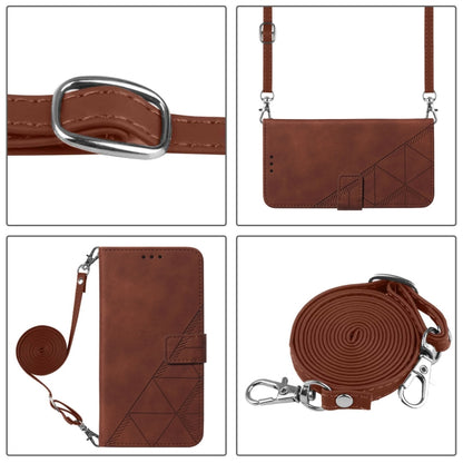Brown embossed flip phone case with metal ring strap and front buckle closure.