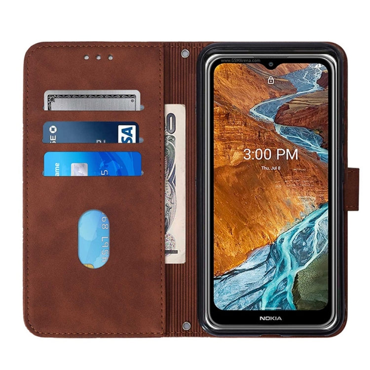 Brown flip phone case with built-in card holder slots and side strap ring.
