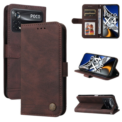 Brown leather wallet phone case with metal button, folio stand and card slots.