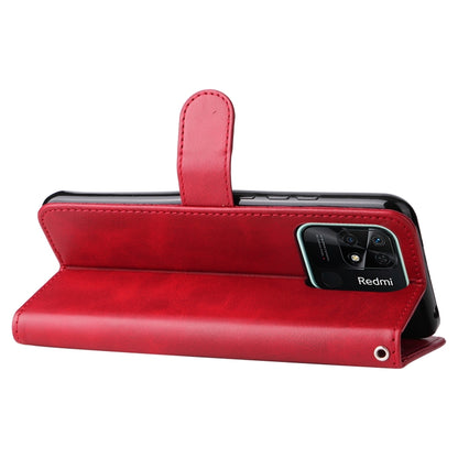 Red leather folio phone case with flip stand, side strap, and camera cutout