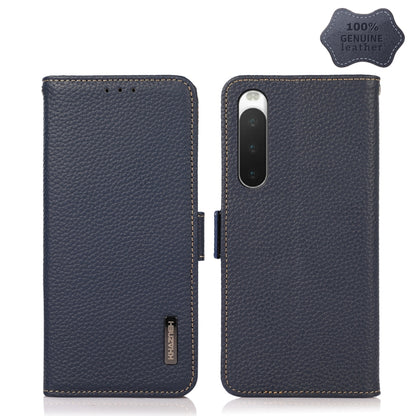 Blue genuine leather flip phone case with side magnetic closure and camera cutout