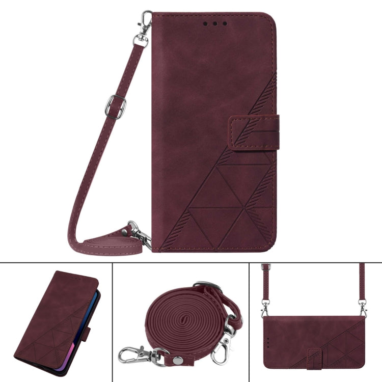 Wine red embossed flip leather phone case with crossbody strap and buckle closure