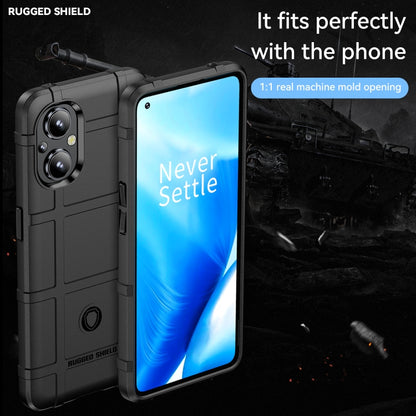 Rugged shockproof TPU phone case in dark gray, shown front and back with camera openings