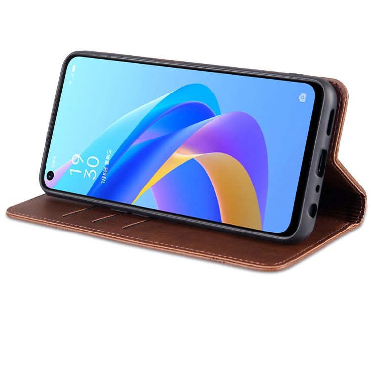 Brown calf-textured leather flip phone case, folded stand view for landscape use