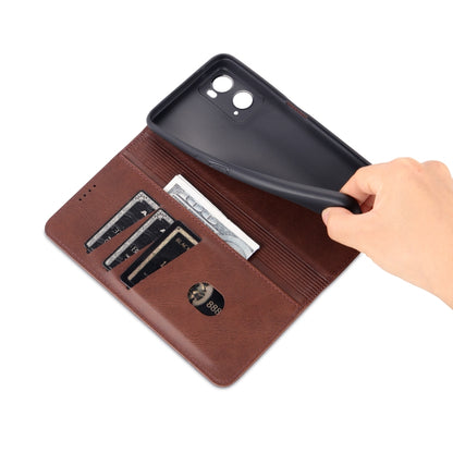Brown calf-textured leather wallet flip phone case with card slots, opened by hand
