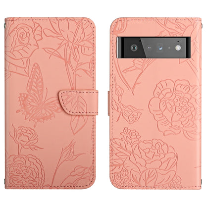 Pink embossed leather phone case with butterfly and floral design, camera window