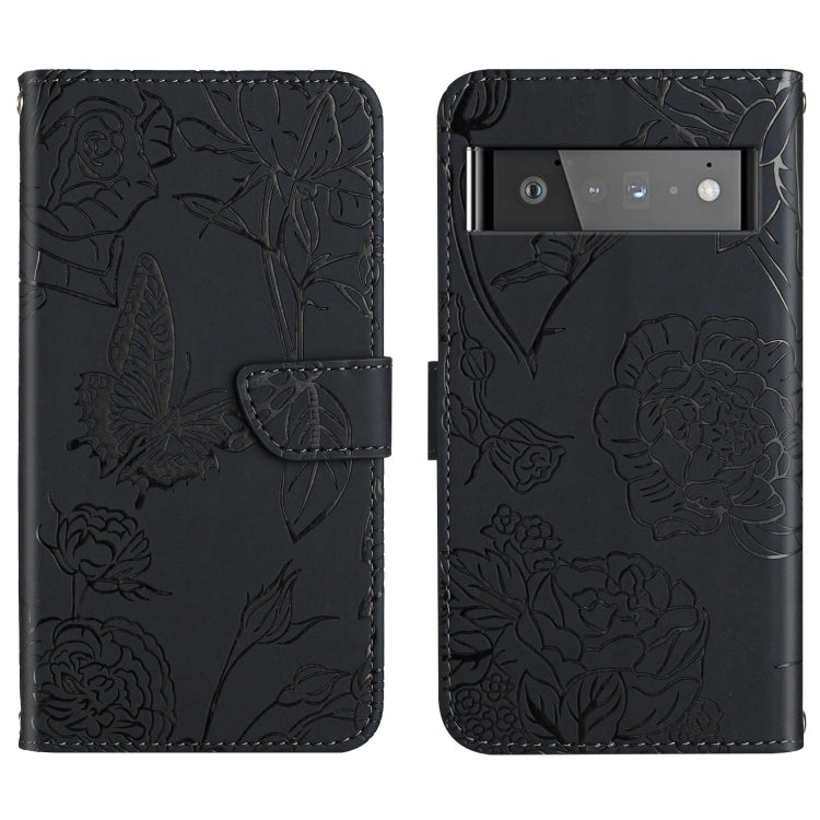 Black embossed leather folio phone case with floral butterfly design and triple camera cutout