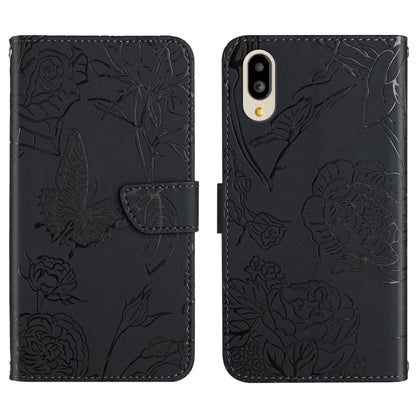 Black embossed floral butterfly leather phone case with folio flap and back camera cutouts