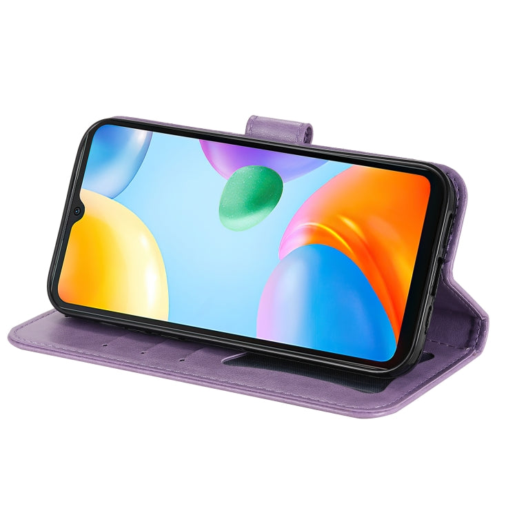 Light purple floral flip phone case propping a phone in landscape view