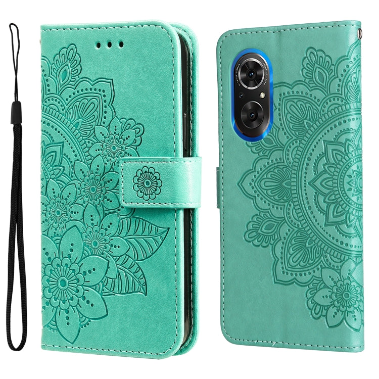 Mint green embossed flower flip phone case with camera cutout and wrist strap.