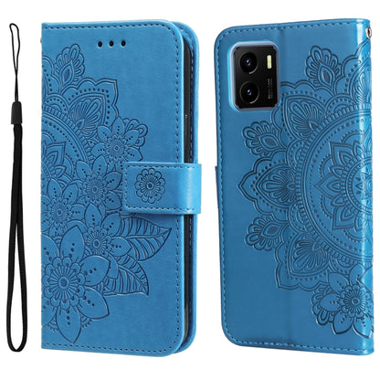 Blue flip phone case with embossed 7-petal floral pattern and wrist strap