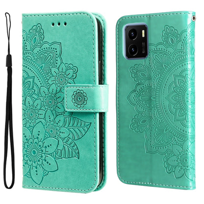 Green flip phone case with embossed 7-petal floral pattern and wrist strap
