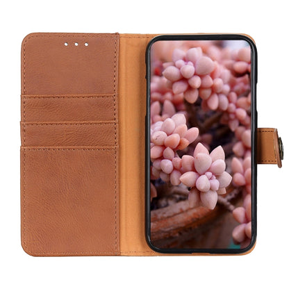 Brown leather flip phone case open, showing card holder and flip cover