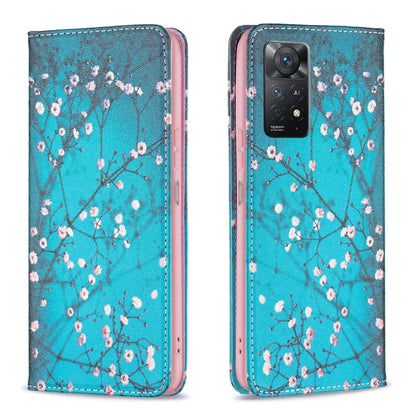 Turquoise magnetic leather phone case with plum blossom pattern and camera cutout.