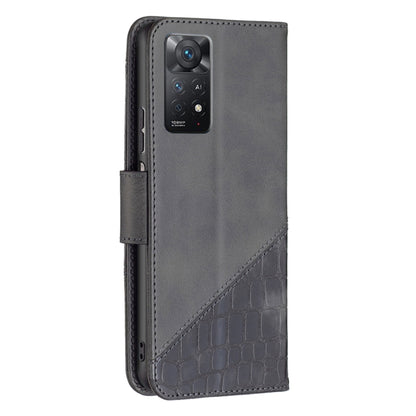 Grey leather phone case with crocodile panel, camera cutout, and side button openings