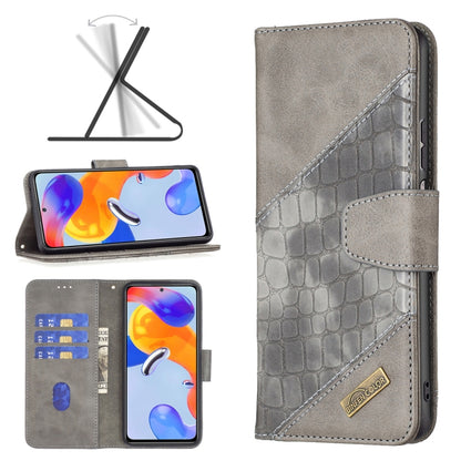 Grey crocodile-texture leather phone case with front wallet flap and phone cutouts