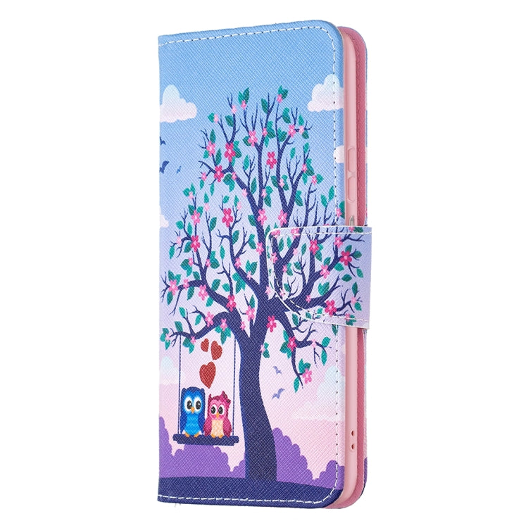 Tree and owl folio phone case with blue border, floral hearts, and magnetic flap