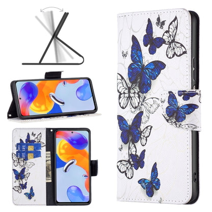 White leather phone case with blue butterflies and vine line art