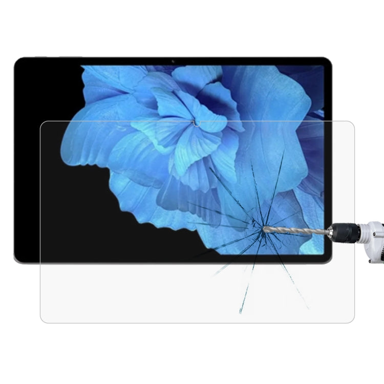 Tempered glass screen protector fitted over tablet screen with impact tool