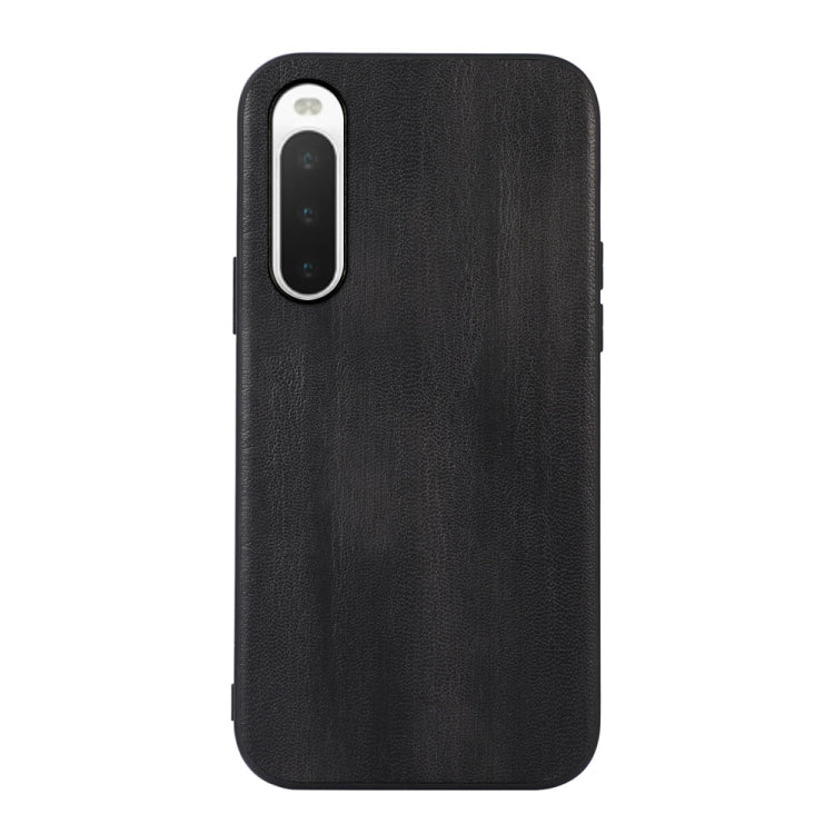 Black textured PU phone case with camera cutout and slim side openings.