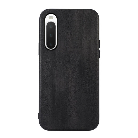 Black textured PU phone case with camera cutout and slim side openings.