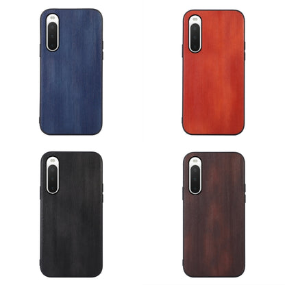 Four-color textured PU phone case set with camera cutouts: blue, red, black, brown.