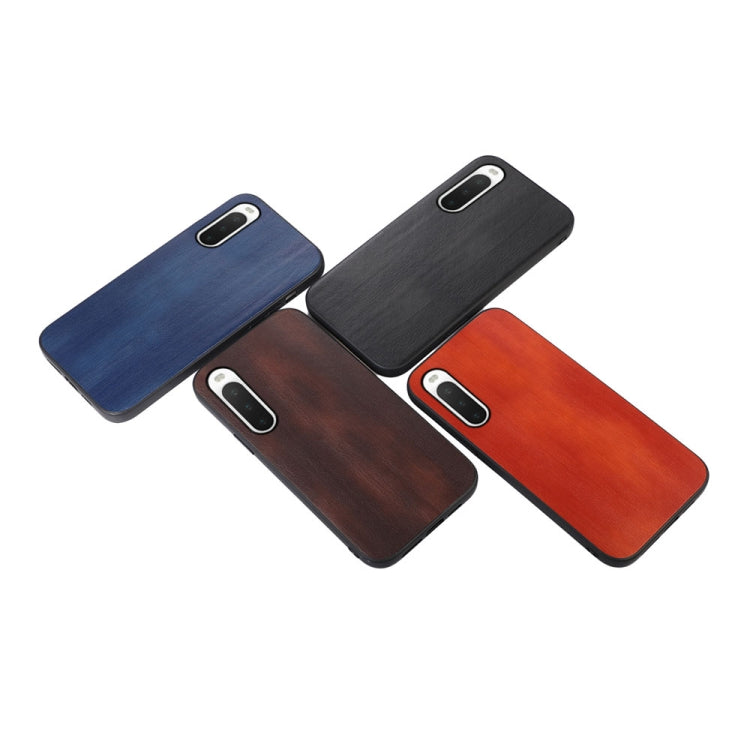 Textured PU phone cases in blue, dark, brown, and orange-red with camera cutouts.