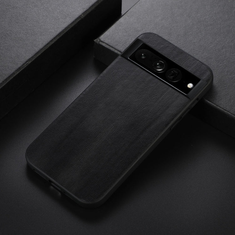 Black textured PU phone case with camera and flash cutouts, angled view