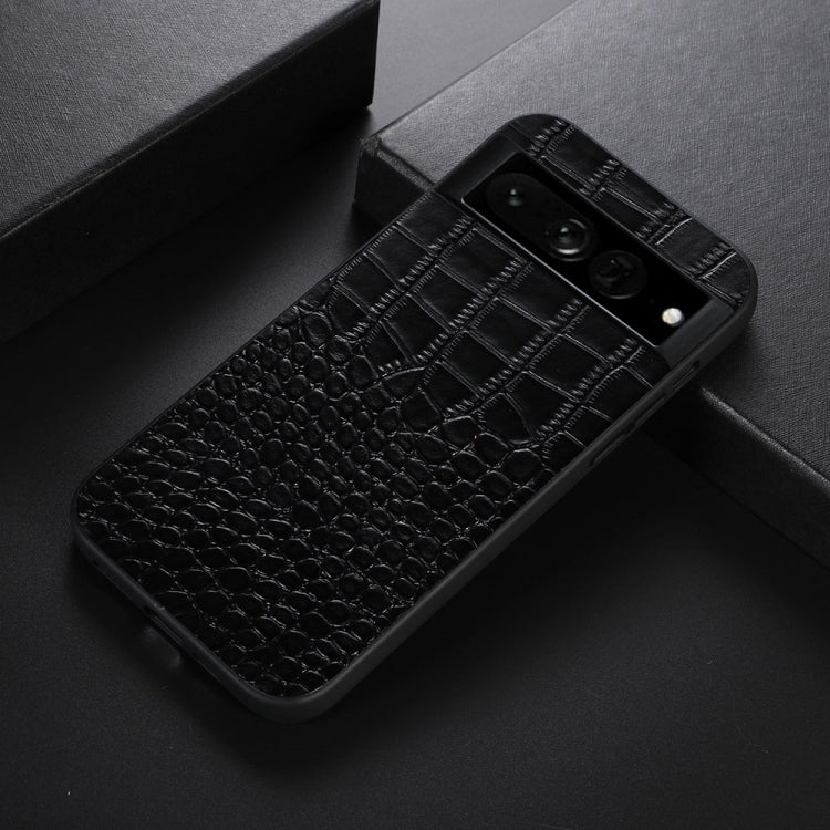 Black crocodile-texture leather phone case with camera openings, angled view