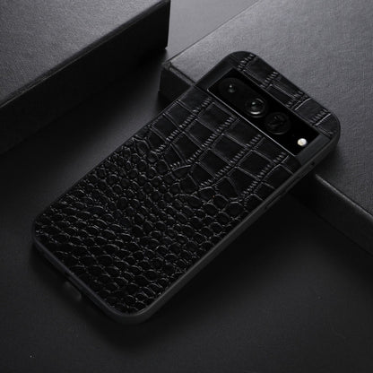 Black crocodile-texture leather phone case with camera openings, angled view
